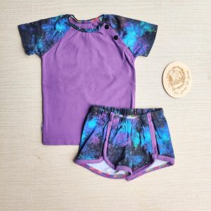 PRE-LOVED; RE-LOVED Age 1 OUTFIT: Track Shorts and Raglan T PLAYWEAR Galaxy (SE)/Purple with Poppered Neckline