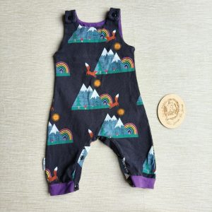 PRE-LOVED; RE-LOVED 3-6m Romper EUC Mountains & Mushrooms/Purple with poppered crotch