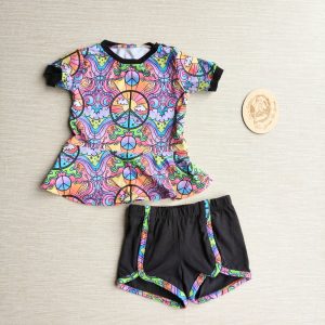 PRE-LOVED; RE-LOVED OUTFIT: Age 2 Peplum T and Track Shorts EUC Peace & Rainbows/Black with poppered neckline